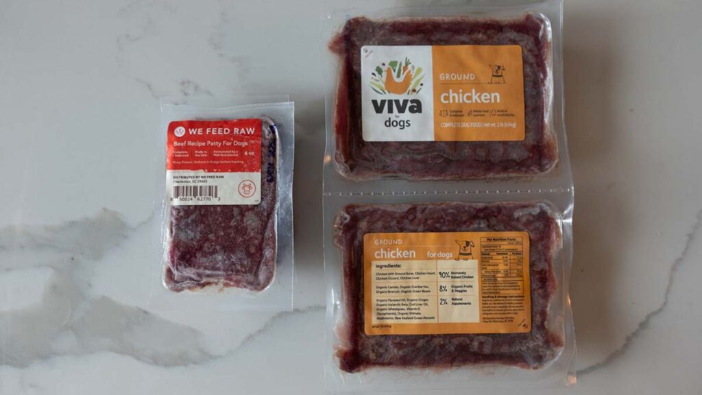 Vacuum-sealed raw pet food packages stacked together