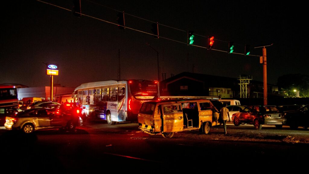 Cars involved in a nighttime traffic crash on a roadway