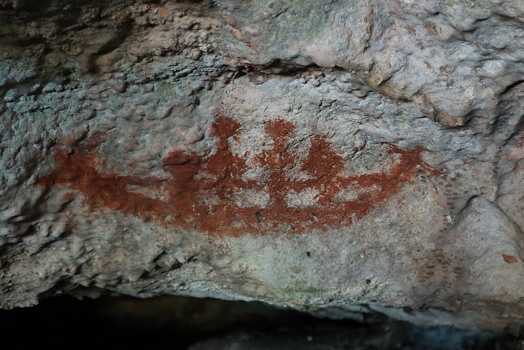 A depiction of a boat in the rock art discovered in Liang Metanduno Cave.